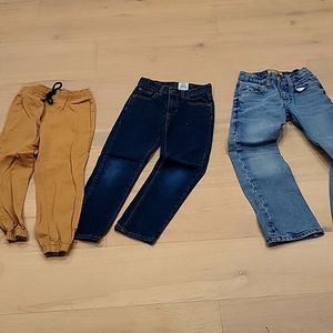 bundle of three Boys youth size 7 two pair of blue jeans one pair of khaki pants
